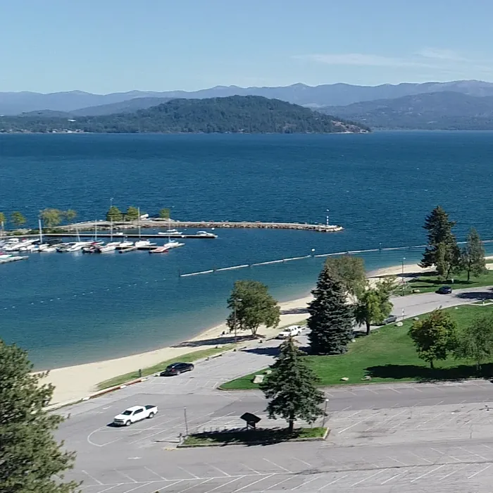 City Beach and the marina in Sandpoint, Idaho, from the air, with Lake Pend Oreille and the mountains behind